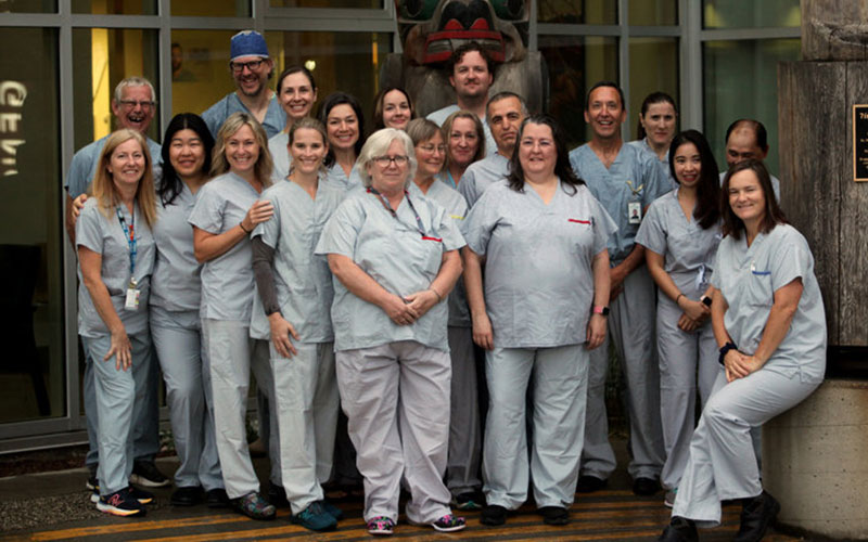 Staff-Education-Fund-final Group photo of Sechelt Hospital medical staff standing together, smiling, outside the hospital
